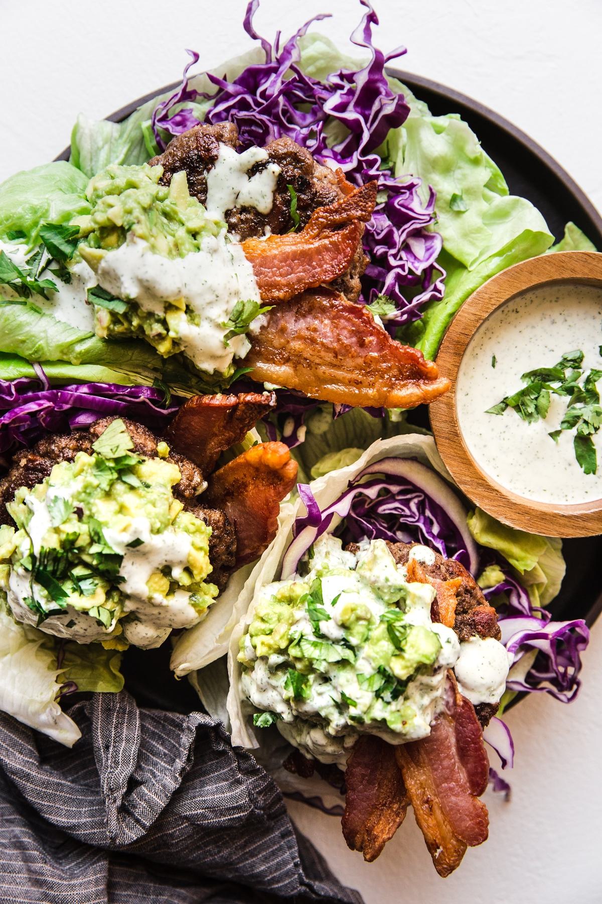 3 Low Carb Bacon Burger With Jalapeño Mayo burgers on a plate