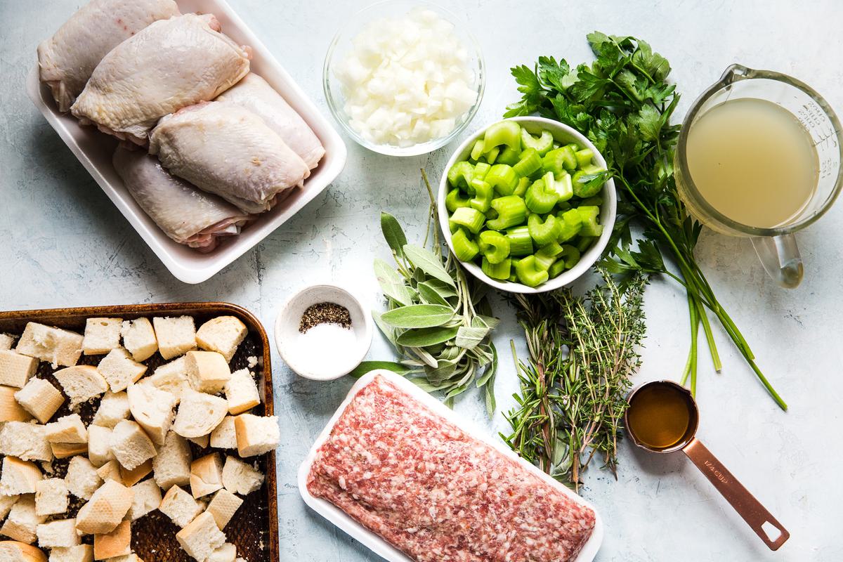 ingredients for one pot chicken and stuffing casserole prepared and laid out in small bowls and plates